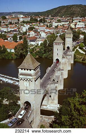 Picture - Houses in town, Pont Valentre, Perigord, Cahors, France . Fotosearch
