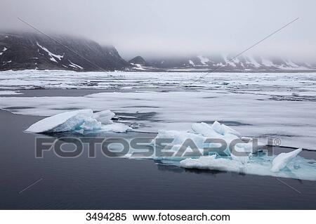 Stock Photography - Ice floes in artic ocean, Spitsbergen, Norway, Europe . Fotosearch