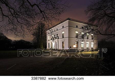 Stock Image - Jenisch House (Jenisch Haus) in the Jenisch Park at night, Hamburg, Germany . Fotosearch