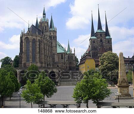 Stock Photo - Low angle view of church against cloudy sky . Fotosearch