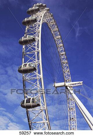 Stock Photo - Low angle view of Ferris wheel, London Eye, London, France, Europe . Fotosearch