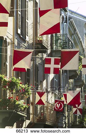 Stock Image - Low angle view of flags, Italy, Europe . Fotosearch
