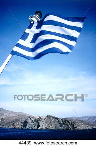 Stock Photo - Low angle view of Greek flag . Fotosearch