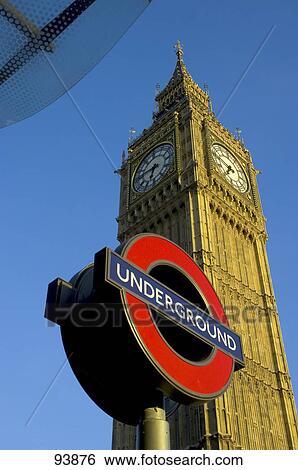 Low angle view of underground signboard near clock tower, Big Ben, London, England View Large Photo Image Stock Photograph - Low angle view of underground signboard near clock tower, Big Ben, London, England . Fotosearch