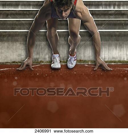 Man on starting blocks View Large Photo Image Stock Image - Man on starting blocks . Fotosearch