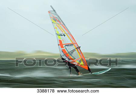Man windsurfing, List, Sylt, Germany View Large Photo Image Stock Photo - Man windsurfing, List, Sylt, Germany . Fotosearch