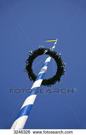 Maypole on the Victuals Market in Munich, Germany, worm's-eye view  View Large Photo Image Stock Photograph - Maypole on the Victuals Market in Munich, Germany, worm's-eye view . Fotosearch