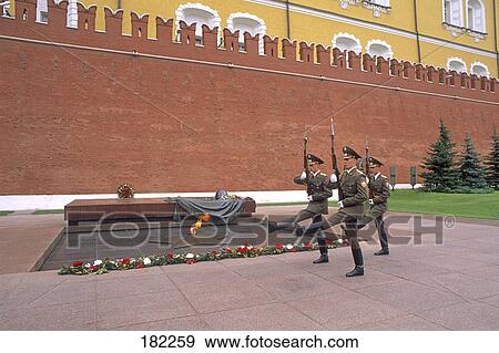 Military guard marching at war memorial, Tomb of the Unknown Soldier, Kremlin Wall, Alexander Garden, Moscow Russia View Large Photo Image Stock Photo - Military guard marching at war memorial, Tomb of the Unknown Soldier, Kremlin Wall, Alexander Garden, Moscow Russia . Fotosearch