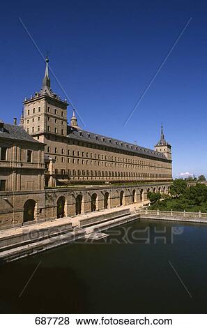 Stock Photo - Monastery at waterfront, San Lorenzo De El Escorial, Castille-La Mancha, Madrid, Spain . Fotosearch