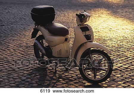 Motor scooter parked on cobblestone path, Rome, Italy View Large Photo Image Stock Photo - Motor scooter parked on cobblestone path, Rome, Italy . Fotosearch