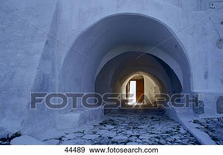 Stock Photo - Narrow lane in front of entrance of house . Fotosearch