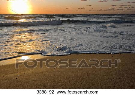 Stock Image - North Sea coast at sunset, Rantum, Sylt, Germany . Fotosearch
