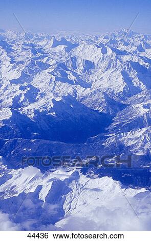 Stock Photograph - Panoramic view of snowcapped mountain range, Mt Matterhorn, Switzerland . Fotosearch