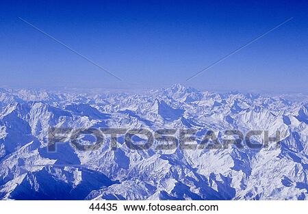 Panoramic view of snowcapped mountain range, Mt Matterhorn, Switzerland View Large Photo Image Stock Photography - Panoramic view of snowcapped mountain range, Mt Matterhorn, Switzerland . Fotosearch