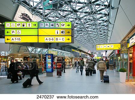 Passengers at airport, Berlin, Germany View Large Photo Image Stock Photo - Passengers at airport, Berlin, Germany . Fotosearch