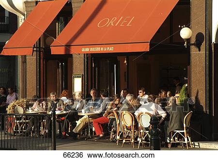 Stock Photograph - People at sidewalk cafe, London, England . Fotosearch