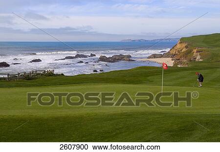 Stock Image - People playing golf, California, USA . Fotosearch