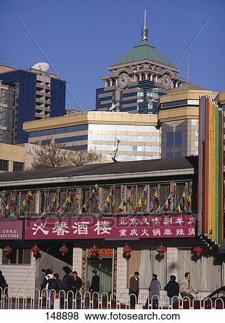 People walking in front of railway station, Central railway station, Peking, China View Large Photo Image Stock Photo - People walking in front of railway station, Central railway station, Peking, China . Fotosearch