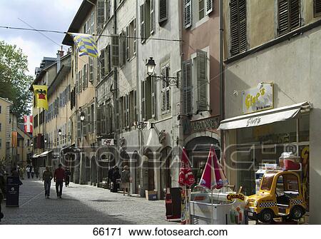 Stock Image - People walking in street, Chambery, Savoie, France . Fotosearch
