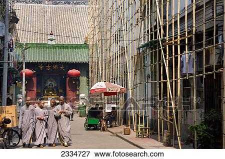 Stock Photo - People walking in street, Guangzhou, Guangdong Province, China . Fotosearch