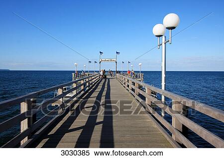 Pier of the Baltic sea spa town of Binz, Rugia, Germany, vanishing point View Large Photo Image Stock Photography - Pier of the Baltic sea spa town of Binz, Rugia, Germany, vanishing point . Fotosearch
