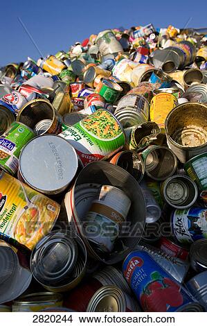 Picture - pile of old tins . Fotosearch