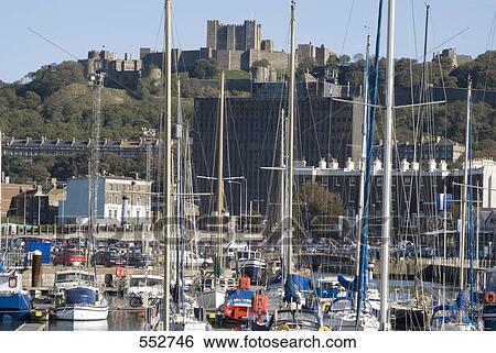 Stock Photograph - Port with castle on hill, Dover Castle, Dover, Kent, England . Fotosearch