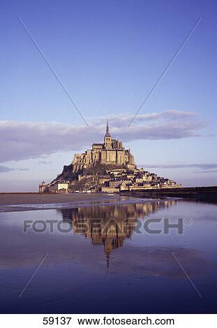 Reflection of Mont Saint-Michel in water, Normandy, France, Europe View Large Photo Image Stock Photo - Reflection of Mont Saint-Michel in water, Normandy, France, Europe . Fotosearch