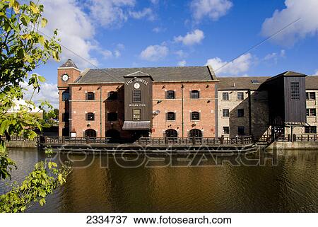 Residential buildings at waterfront, Wigan, England View Large Photo Image Stock Photo - Residential buildings at waterfront, Wigan, England . Fotosearch