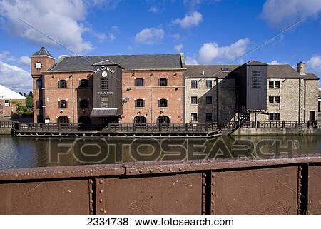 Stock Photo - Residential buildings at waterfront, Wigan, England . Fotosearch
