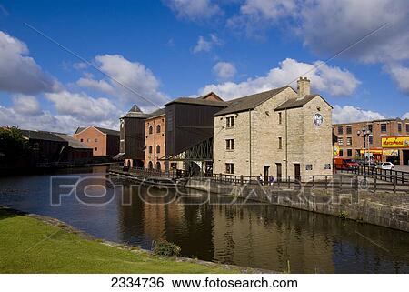 Stock Photograph - Residential buildings at waterfront, Wigan, England . Fotosearch