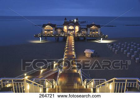 Stock Image - Resort lit up at night, Rugen Island, Mecklenburg-West Pomerania, Germany . Fotosearch