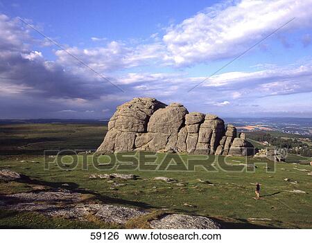 Stock Photograph - Rock formations on a landscape, Dartmoor, Devon, England . Fotosearch