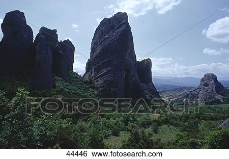 Stock Photograph - Rock formations on landscape, Meteora, Greece . Fotosearch