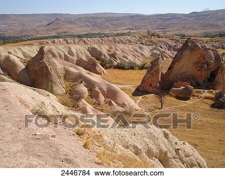 Rock formations on landscape, Cappadocia, Anatolia, Turkey View Large Photo Image Picture - Rock formations on landscape, Cappadocia, Anatolia, Turkey . Fotosearch