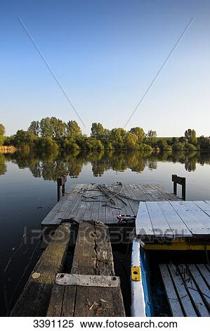 Rowing boat at lake View Large Photo Image Stock Photography - Rowing boat at lake . Fotosearch