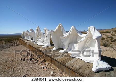 Sculptures of ghost on landscape, Goldwell Open Air Museum, Rhyolite, Nevada, USA View Large Photo Image Stock Image - Sculptures of ghost on landscape, Goldwell Open Air Museum, Rhyolite, Nevada, USA . Fotosearch