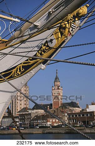 Ship's bow with city hall in background, Nord, Nord-Pas-de-Calais, France View Large Photo Image Stock Photography - Ship's bow with city hall in background, Nord, Nord-Pas-de-Calais, France . Fotosearch