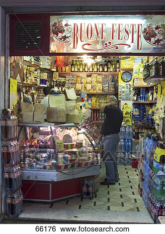 Side profile of man standing in general store, Palermo, Sicily, Italy View Large Photo Image Stock Photograph - Side profile of man standing in general store, Palermo, Sicily, Italy . Fotosearch