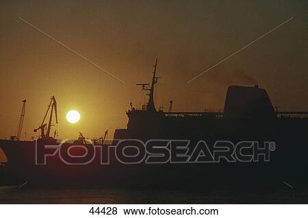 Stock Photo - Silhouette of ferry at harbor, Herakleion, Crete Island, Greece . Fotosearch