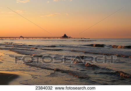 Silhouette of pier at dusk, Heringsdorf, Mecklenburg-Western Pomerania, Germany View Large Photo Image Stock Image - Silhouette of pier at dusk, Heringsdorf, Mecklenburg-Western Pomerania, Germany . Fotosearch