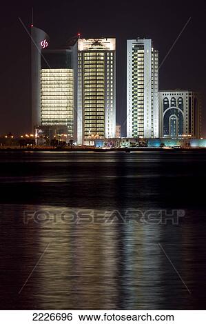 Skyscrapers at waterfront, Doha, Qatar View Large Photo Image Stock Photograph - Skyscrapers at waterfront, Doha, Qatar . Fotosearch