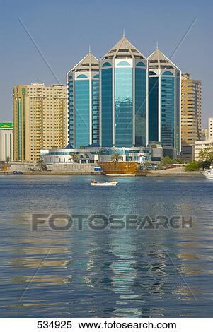 Stock Photography - Skyscrapers at waterfront, United Arab Emirates . Fotosearch