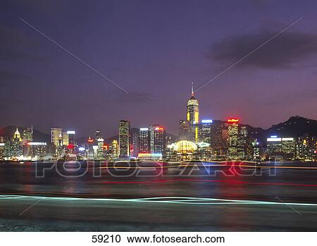 Skyscrapers illuminated at Dusk, Hong Kong, China, Asia View Large Photo Image Stock Image - Skyscrapers illuminated at Dusk, Hong Kong, China, Asia . Fotosearch