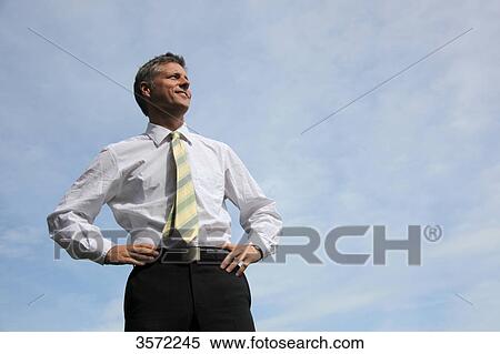 Smiling businessman outdoors View Large Photo Image Stock Photography - Smiling businessman outdoors . Fotosearch