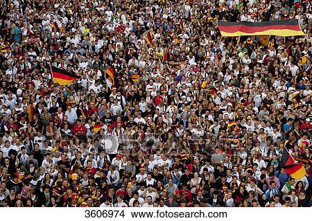 Picture - Soccer fans during 2010 FIFA World Cup on the Fanmeile Berlin, Germany . Fotosearch