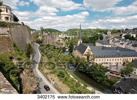 Stock Photography - St. Johanneskirche and abbey Neumuenster, Grund, Luxemburg, Europe . Fotosearch