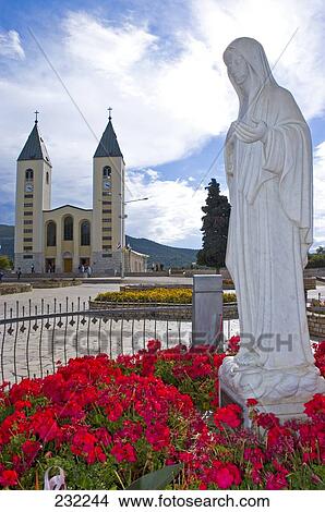 Statue of Virgin Mary outside church, St James Church, Medjugorje, Bosnia And Herzegovina, Croatia, Former Yugoslavia View Large Photo Image Picture - Statue of Virgin Mary outside church, St James Church, Medjugorje, Bosnia And Herzegovina, Croatia, Former Yugoslavia . Fotosearch