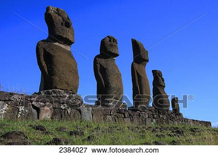 Stock Photo - Statues in row, Moai Statue, Easter Island, Chile . Fotosearch