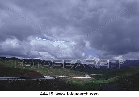Storm clouds over landscape, Metsovo, Ioannina, Greece View Large Photo Image Stock Photography - Storm clouds over landscape, Metsovo, Ioannina, Greece . Fotosearch